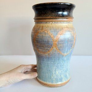 Large hand made blue and brown ceramic vase.